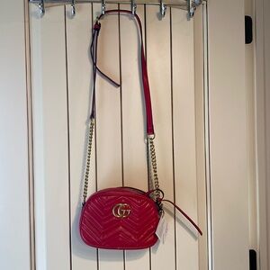 New red crossbody look closely and read the tag